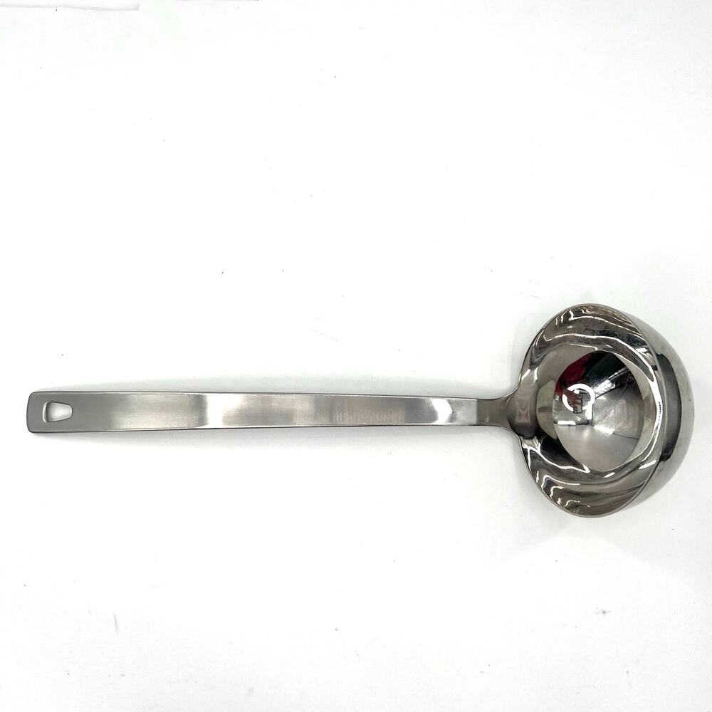 Williams Sonoma stainless Steel ladle with  hole for hanging